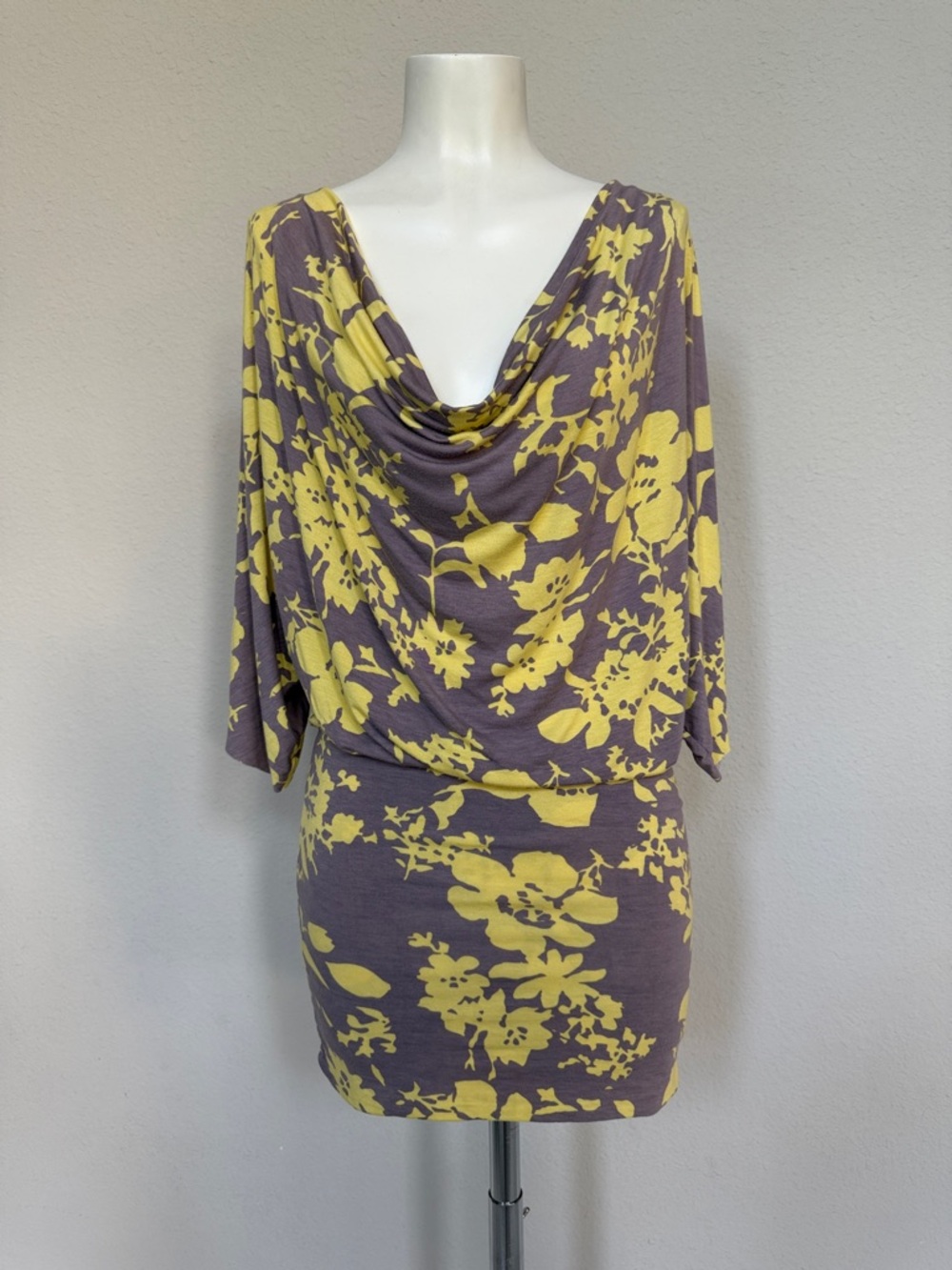 Rachel Pally Yellow Floral Draped Neck Dress on Mauve Background